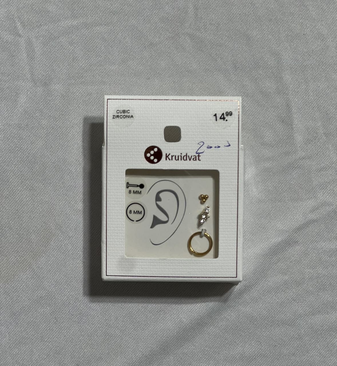 قُرْط
